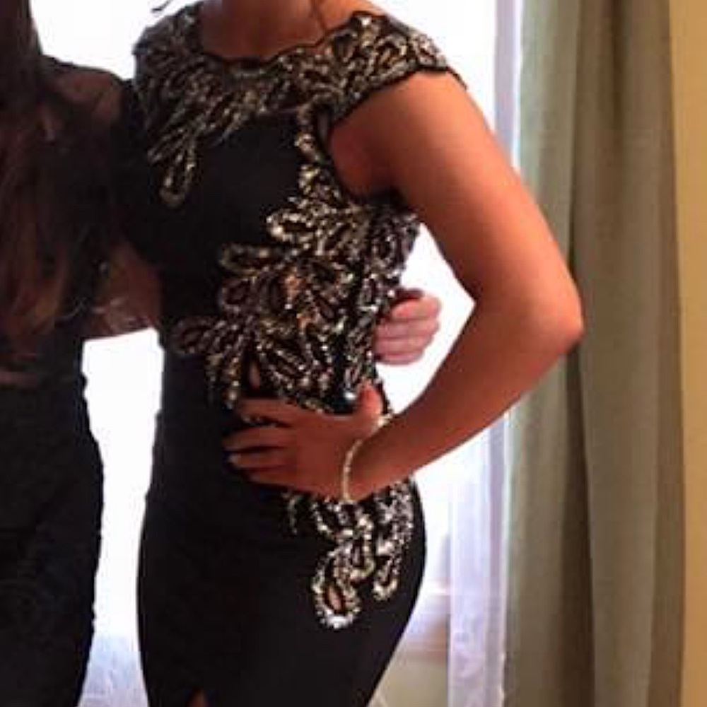 Floor length black bedazzled dress with slit